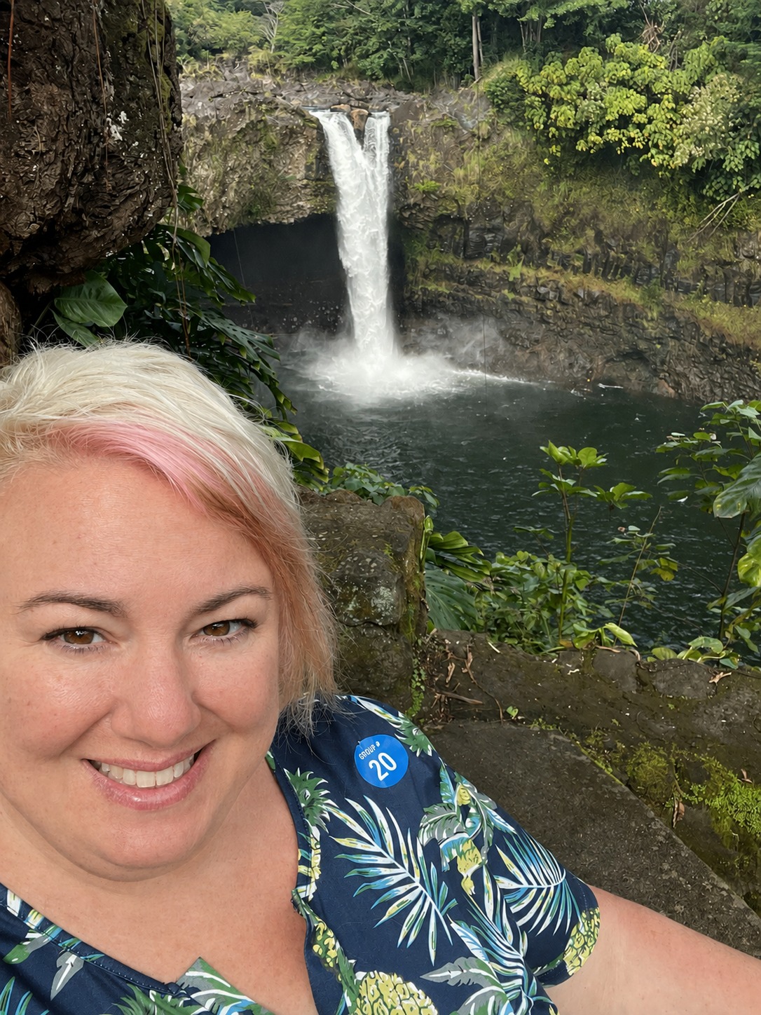Jenn exploring a tropical waterfall destination